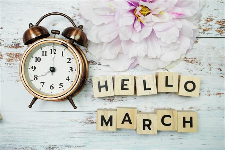 HELLO MARCH - hello-march-alarm-clock-wooden-background-185900313.jpg